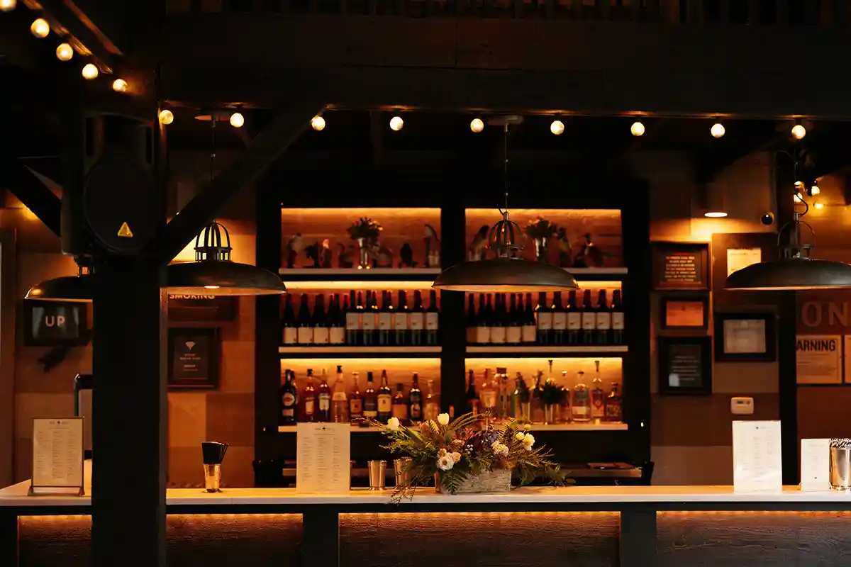 Classy vintage bar at the wedding party space at Roxbury Barn & Estate, a natural wedding venue in the Catskills and Hudson Valley region of New York