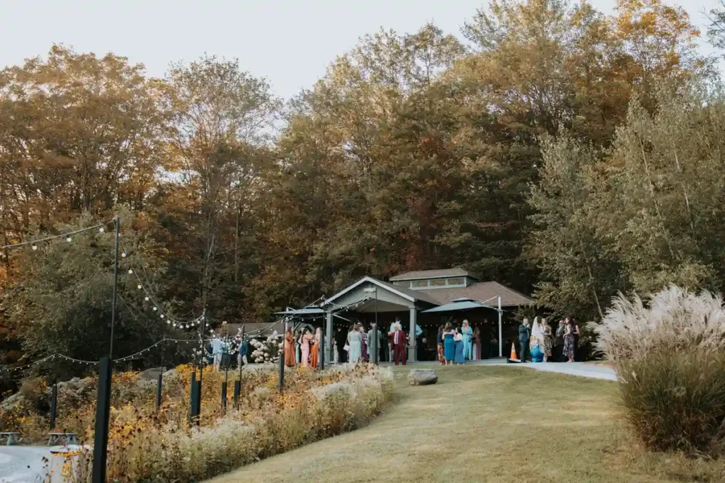 Cocktail hour at the hilltop pavilion for a fall wedding at Roxbury Barn & Estate in the Catskill Mountains