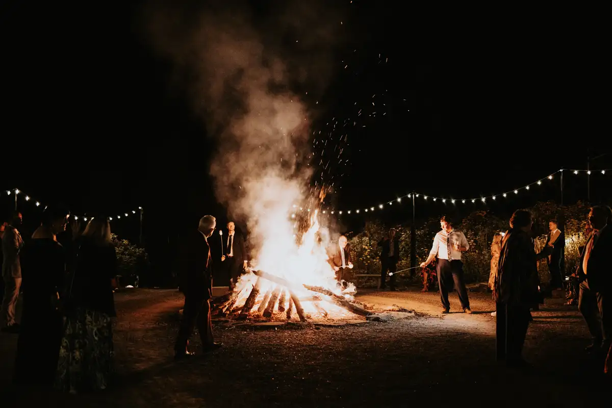 Finale of a Catskills wedding at Roxbury Barn & Estate in Upstate New York, with a large size bonfire under the stars